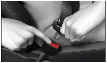 Fig. 2 Releasing the buckle tongue from the safety belt buckle (general example).